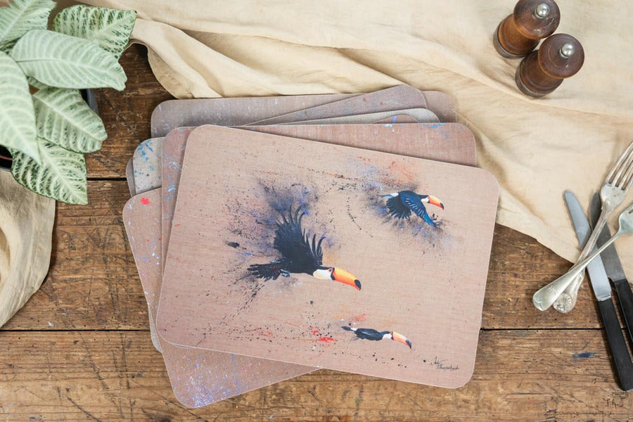 A closer look at the fine detail and expressive brushwork of our artist-painted bird designs.